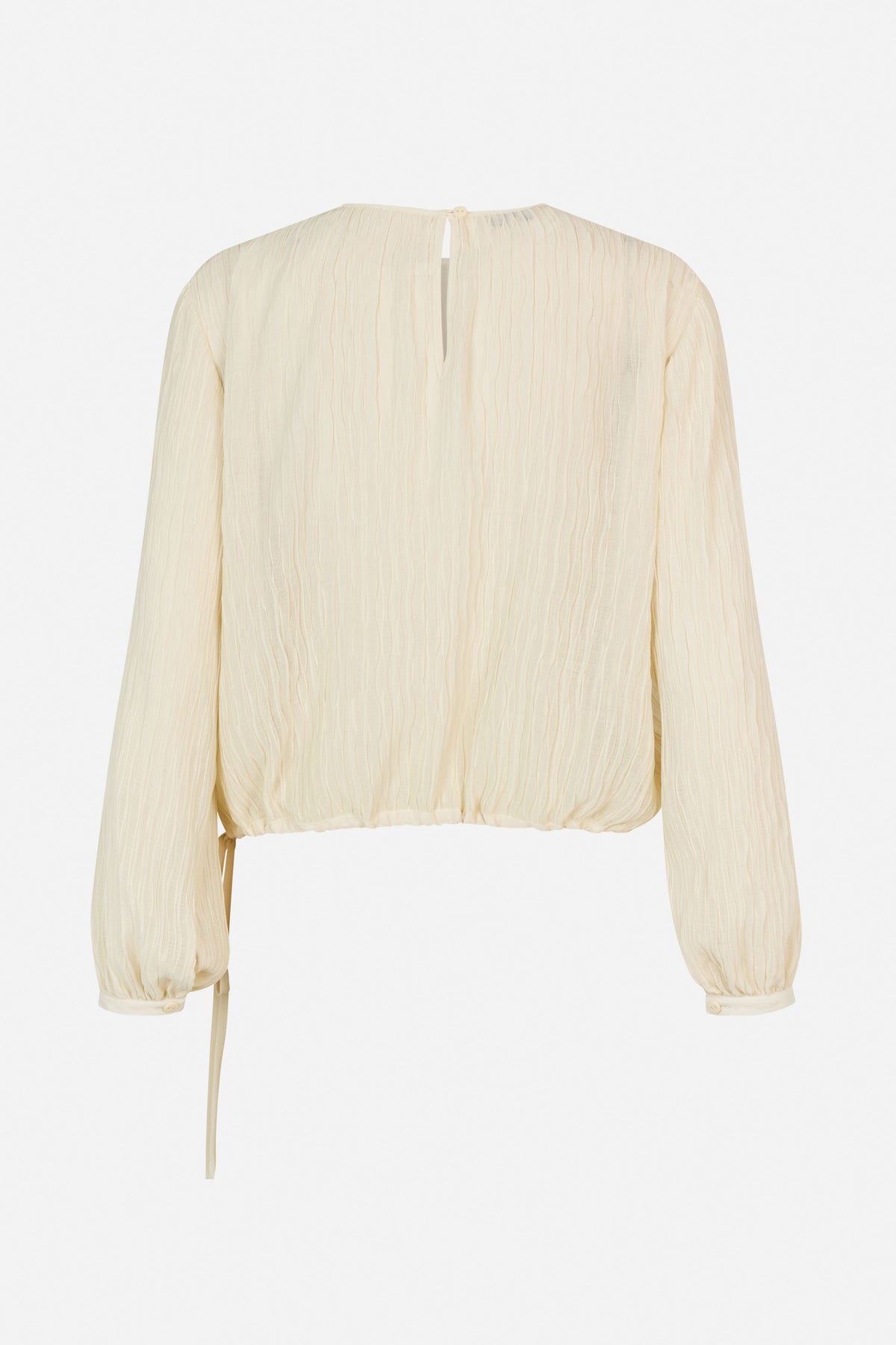 Back view of an ivory crinkled long-sleeve blouse with a button keyhole, gathered cuffs and hem, and a side tie.