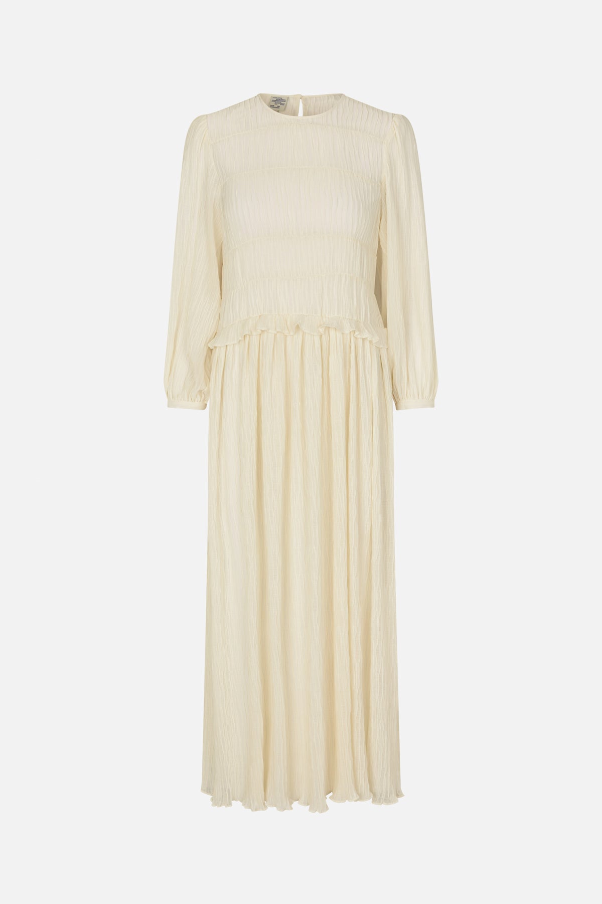 Front view of an ivory long-sleeved maxi dress with a round neckline, textured vertical gathers and a ruffled waist seam.