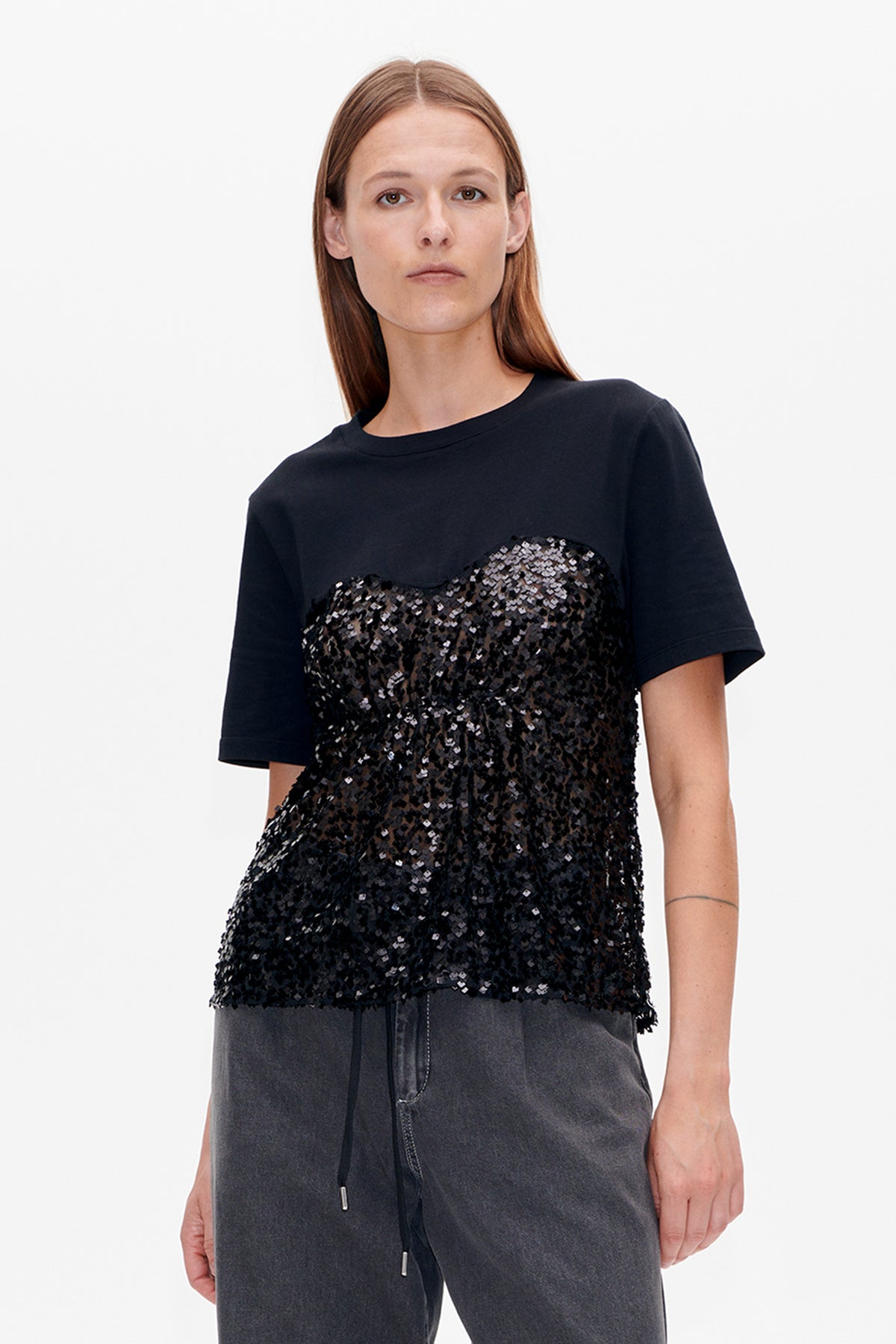 Dark navy short-sleeved crew-neck top with a black and silver sequin front panel, shown on a model.