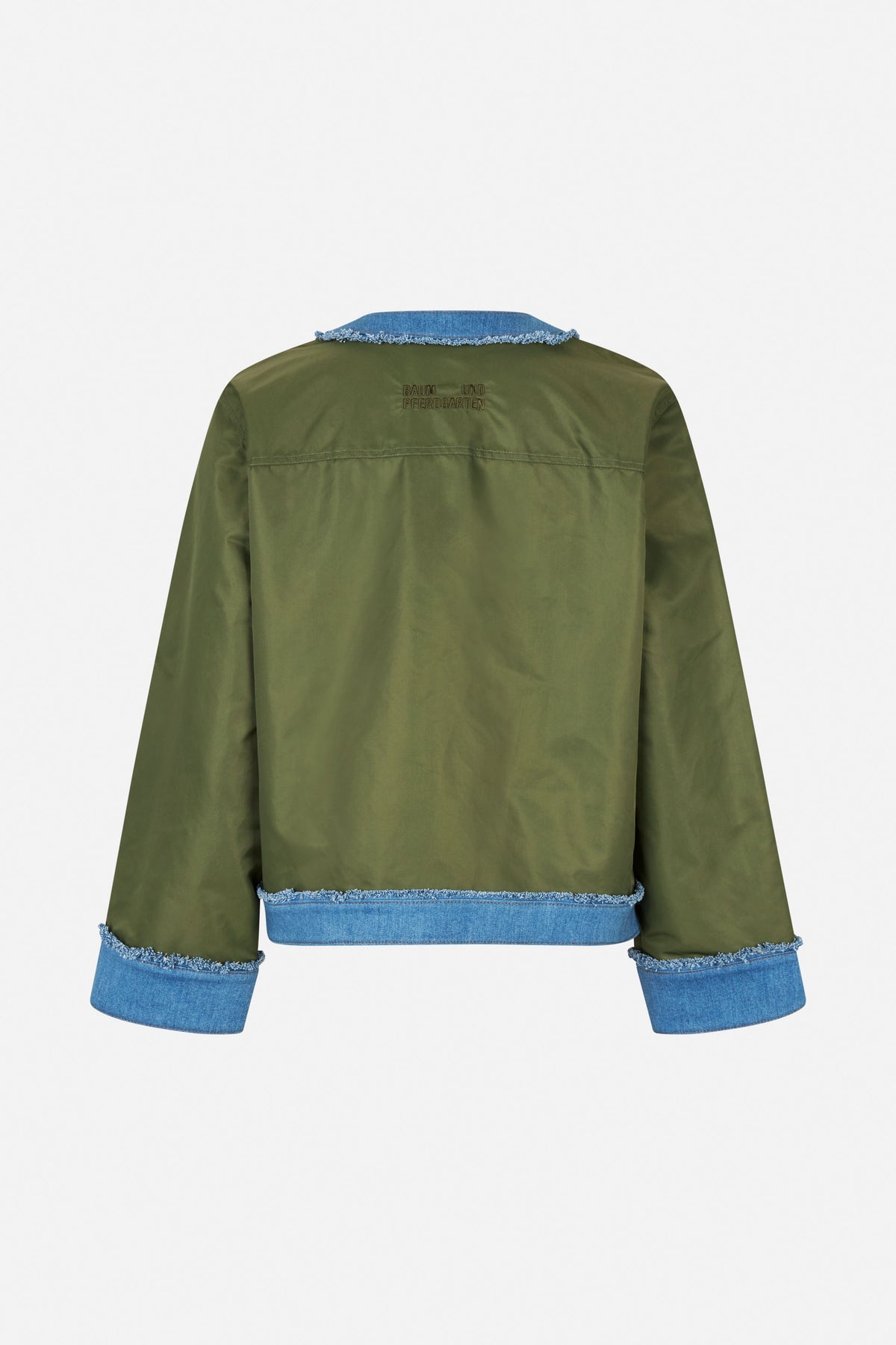 Back view of an olive green jacket with blue denim collar, cuffs and hem, frayed edges and embroidered Baum und Pferdgarten lettering.