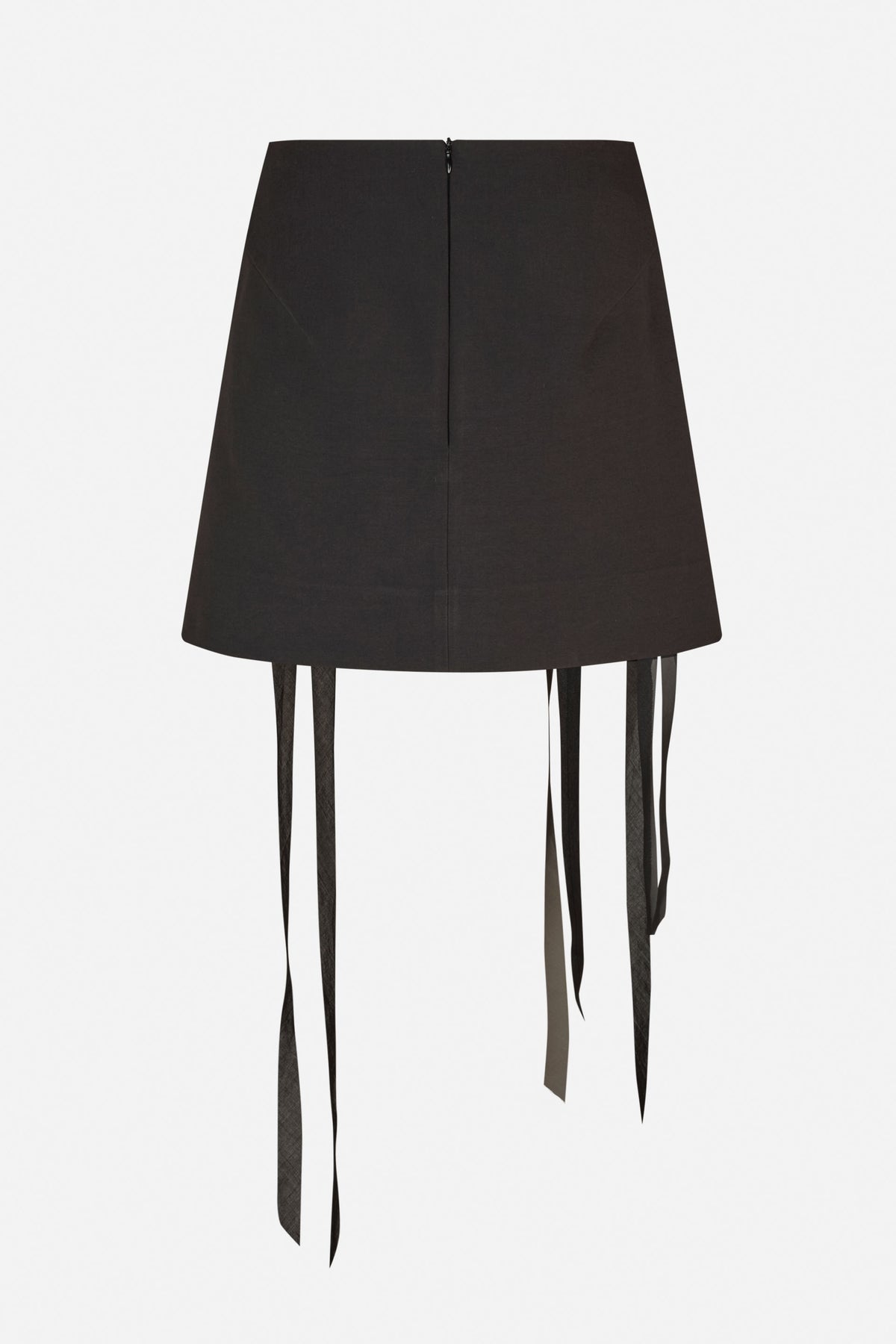 Back view of a black flared skirt with a centre-back zip and long narrow ties hanging below the hem.
