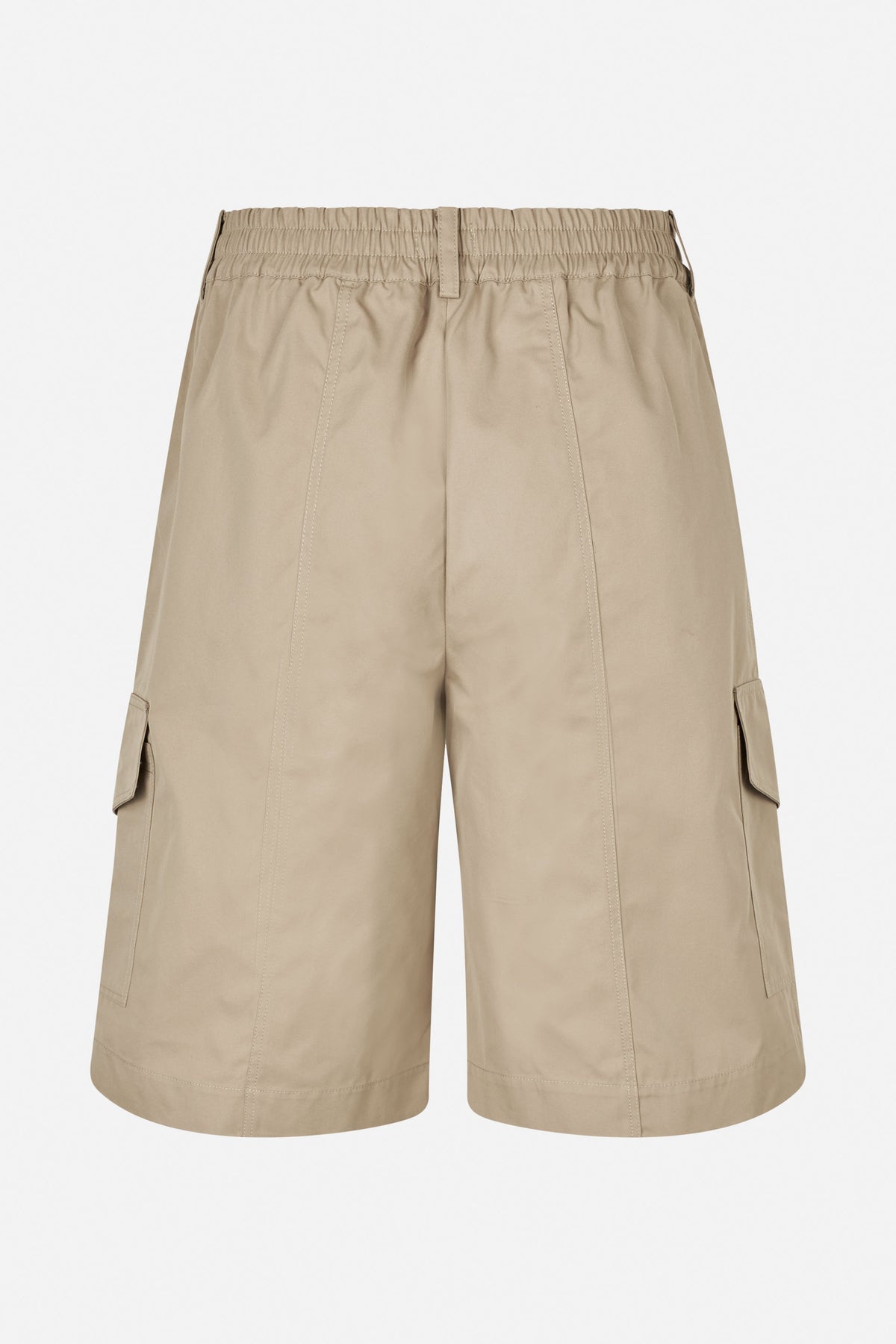 Front view of light beige knee-length shorts with an elasticated waist, stitched panels and flap cargo pockets.