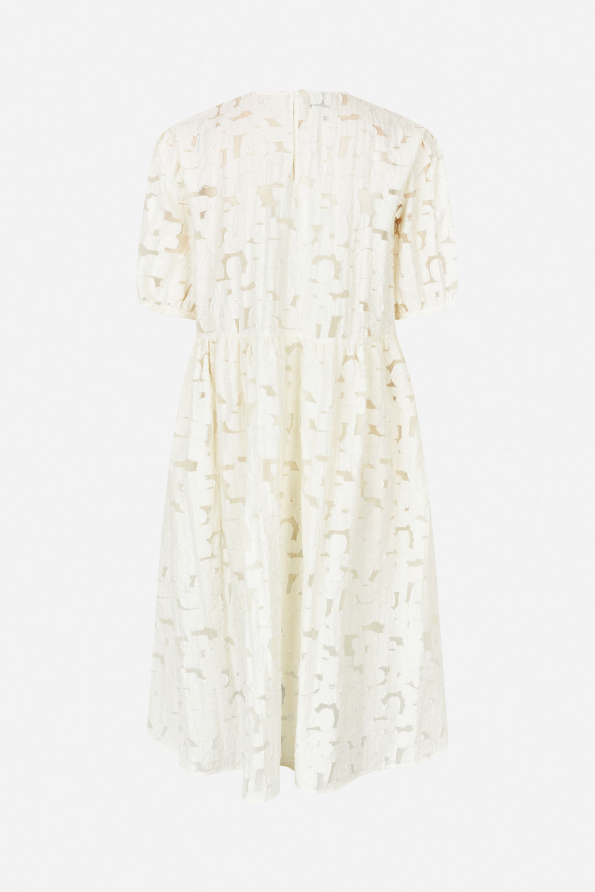 Back view of an ivory dress with short sleeves, a gathered waist and an abstract geometric textured pattern.