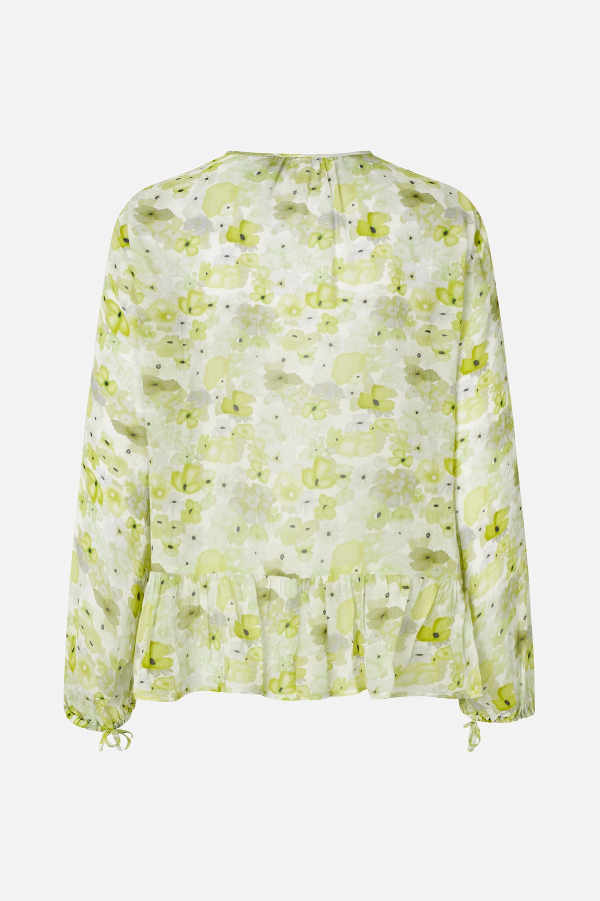 Achteraanzicht van een witte blouse met lange mouwen, limoengroene bloemenprint, geplooide peplumzoom en manchetten met strik