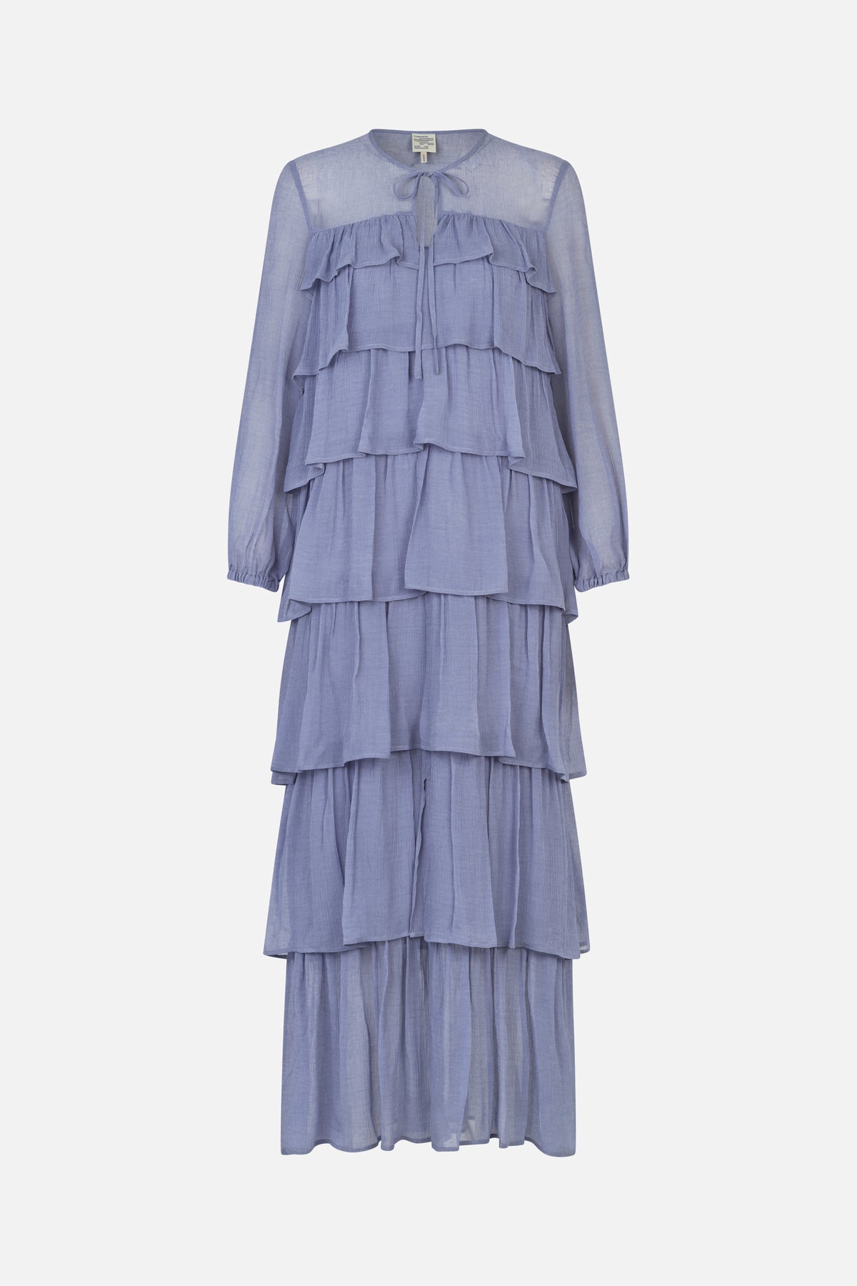 Front view of a long-sleeved, tiered blue dress with a tie neckline, gathered cuffs and cascading ruffles.