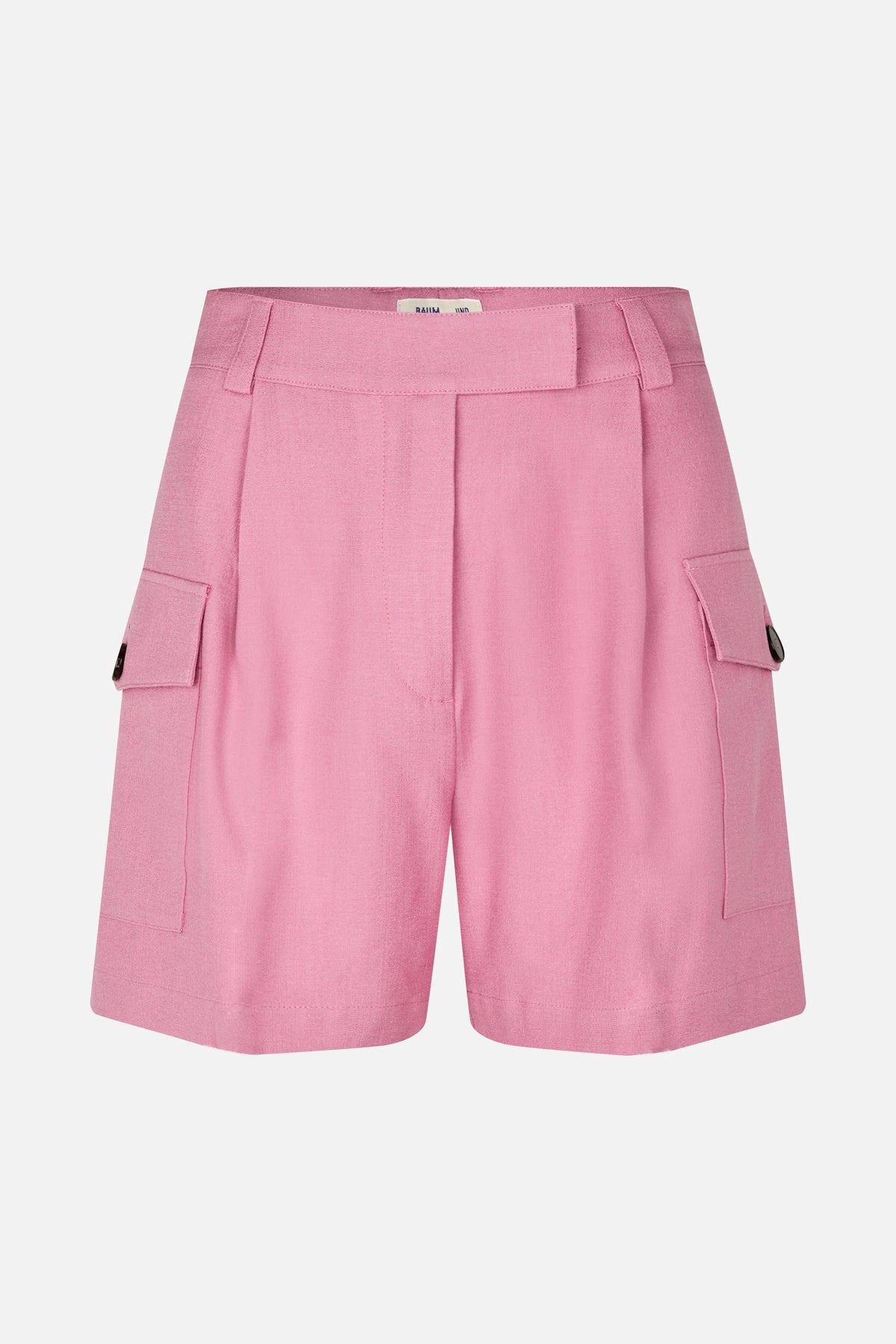 Front view of pink tailored shorts with a wide waistband, front pleats, and side flap pockets with dark buttons.