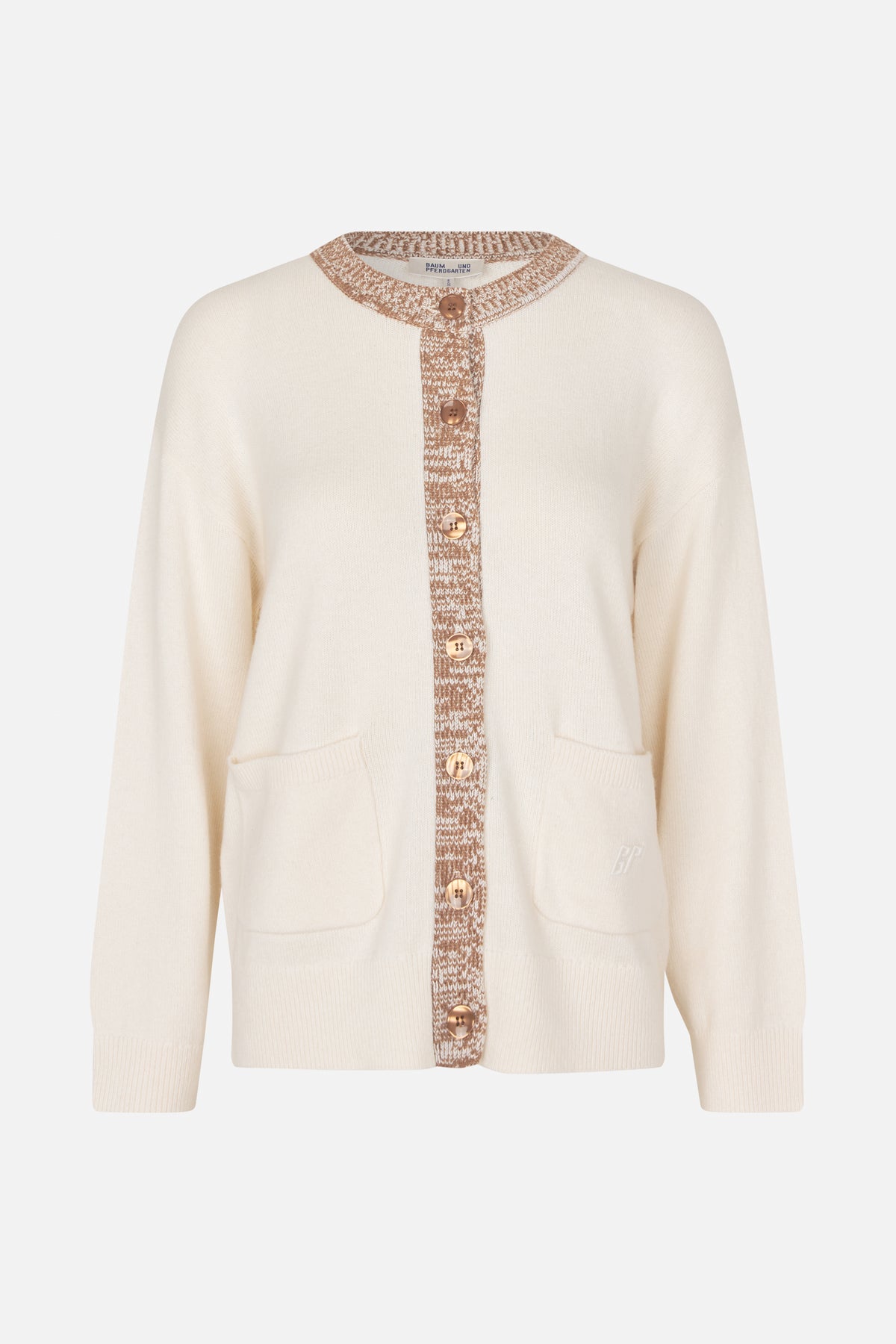 Front view of an ivory knit cardigan with brown patterned trim, tonal buttons, long sleeves and two patch pockets.