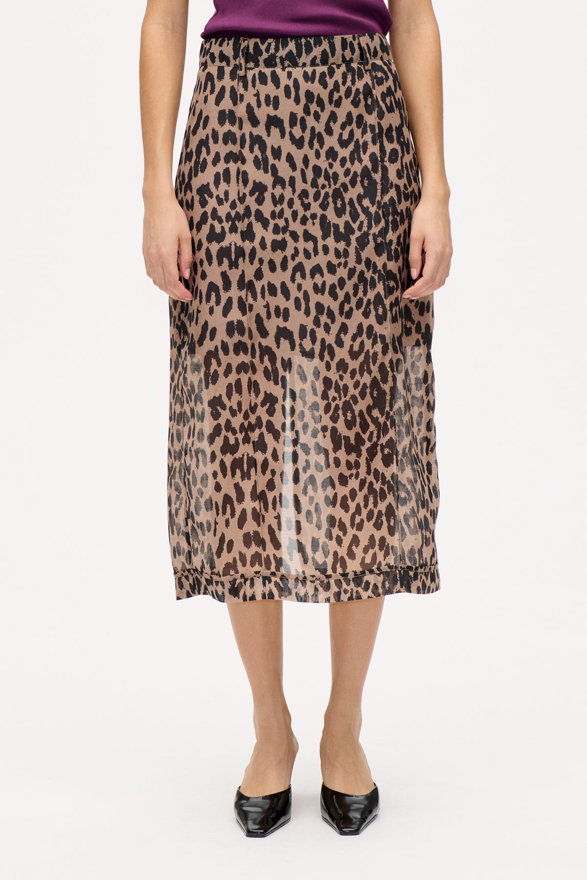Front view of a knee-length skirt with a taupe and black abstract animal-print pattern and a panel seam near the hem.