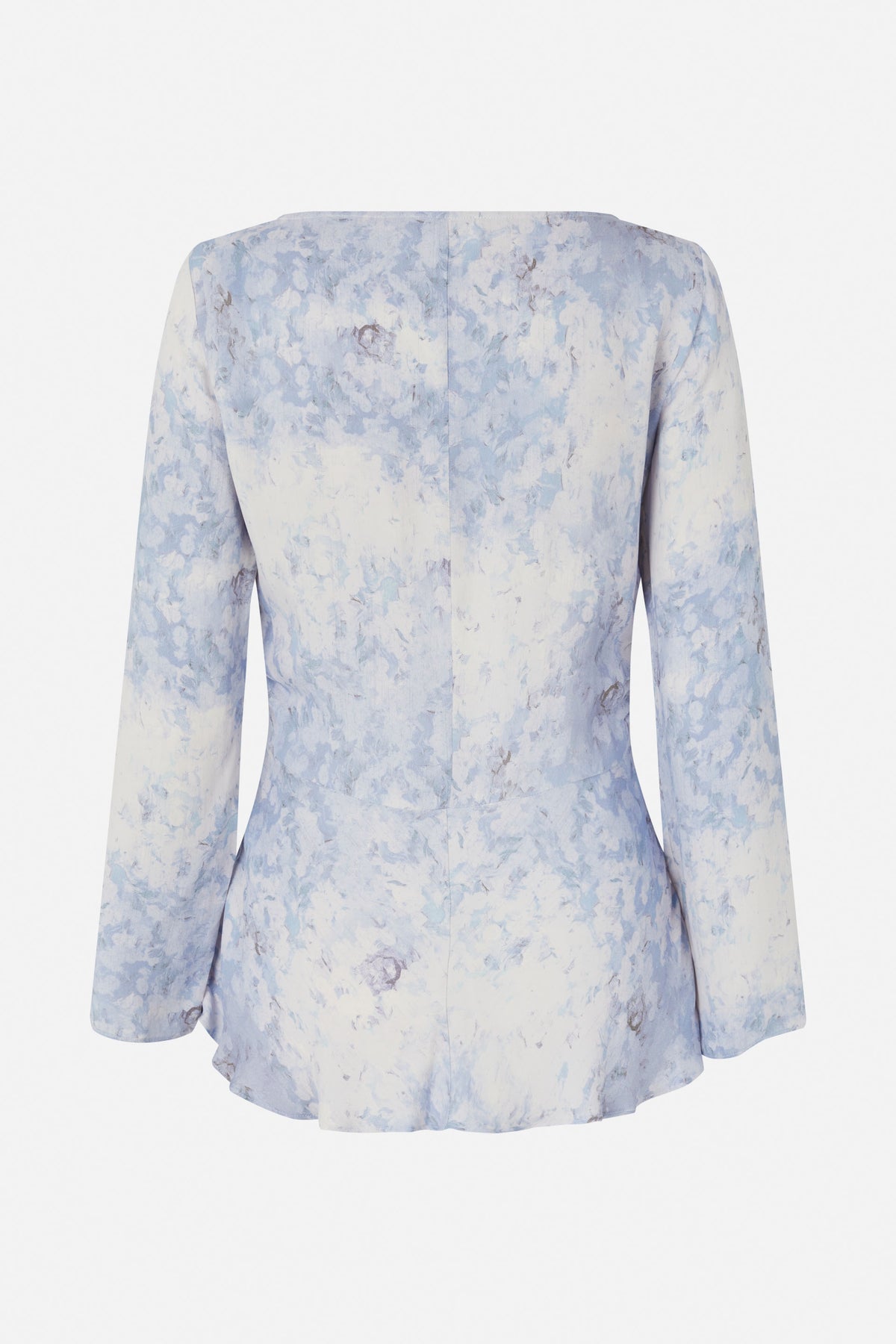 Back view of a long-sleeved blouse in a pale blue and white abstract floral print, with a fitted waist and flared hem.