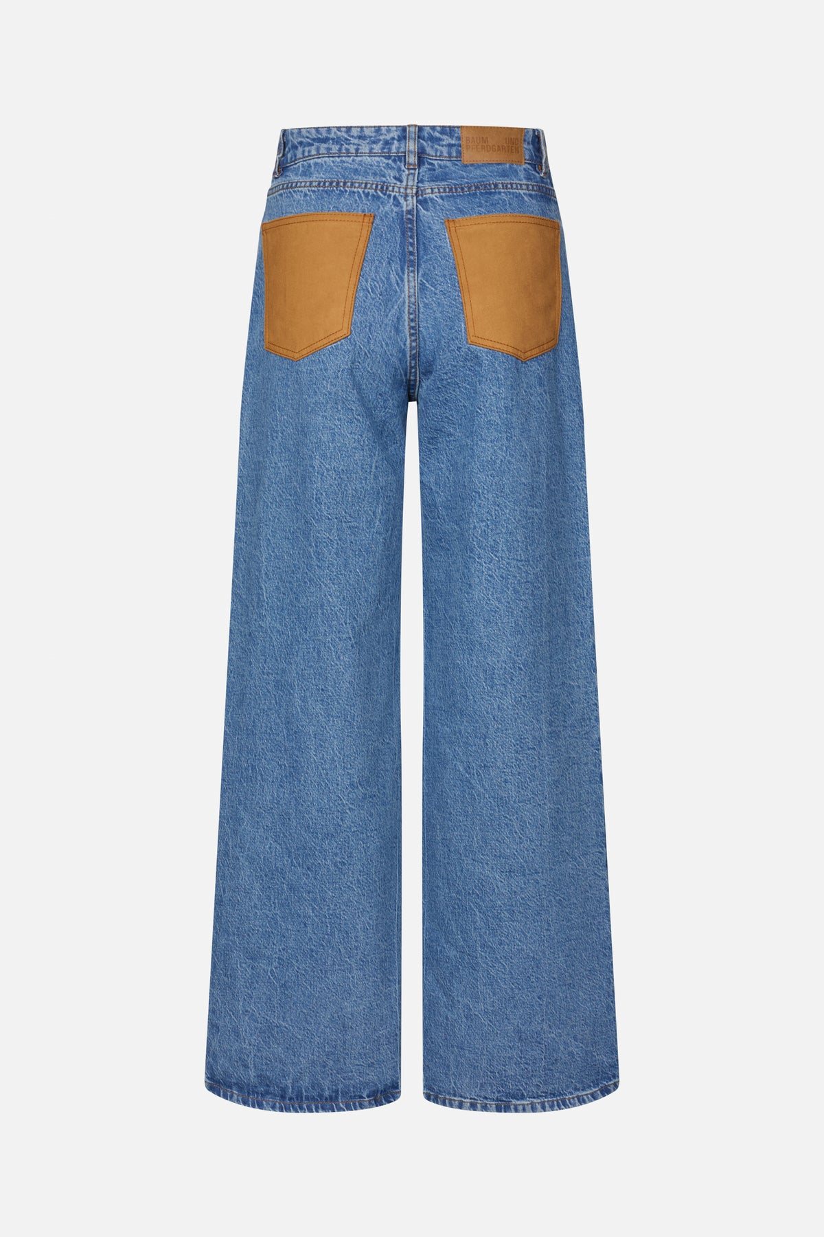 Rear view of wide-leg blue washed denim jeans with two tan contrast back pockets and a tan waistband patch.