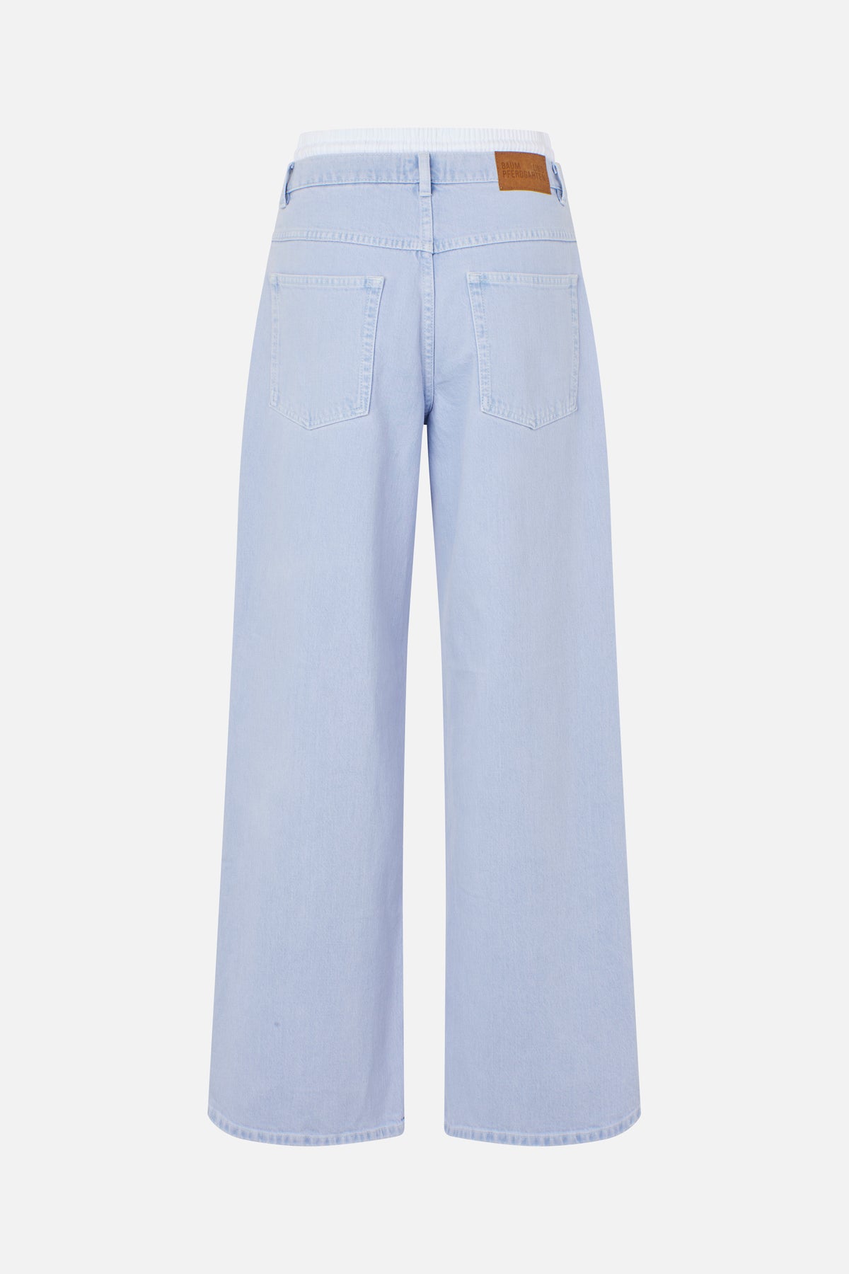 Back view of pale blue wide-leg jeans with two back pockets, a brown waistband patch and a white elastic waistband.