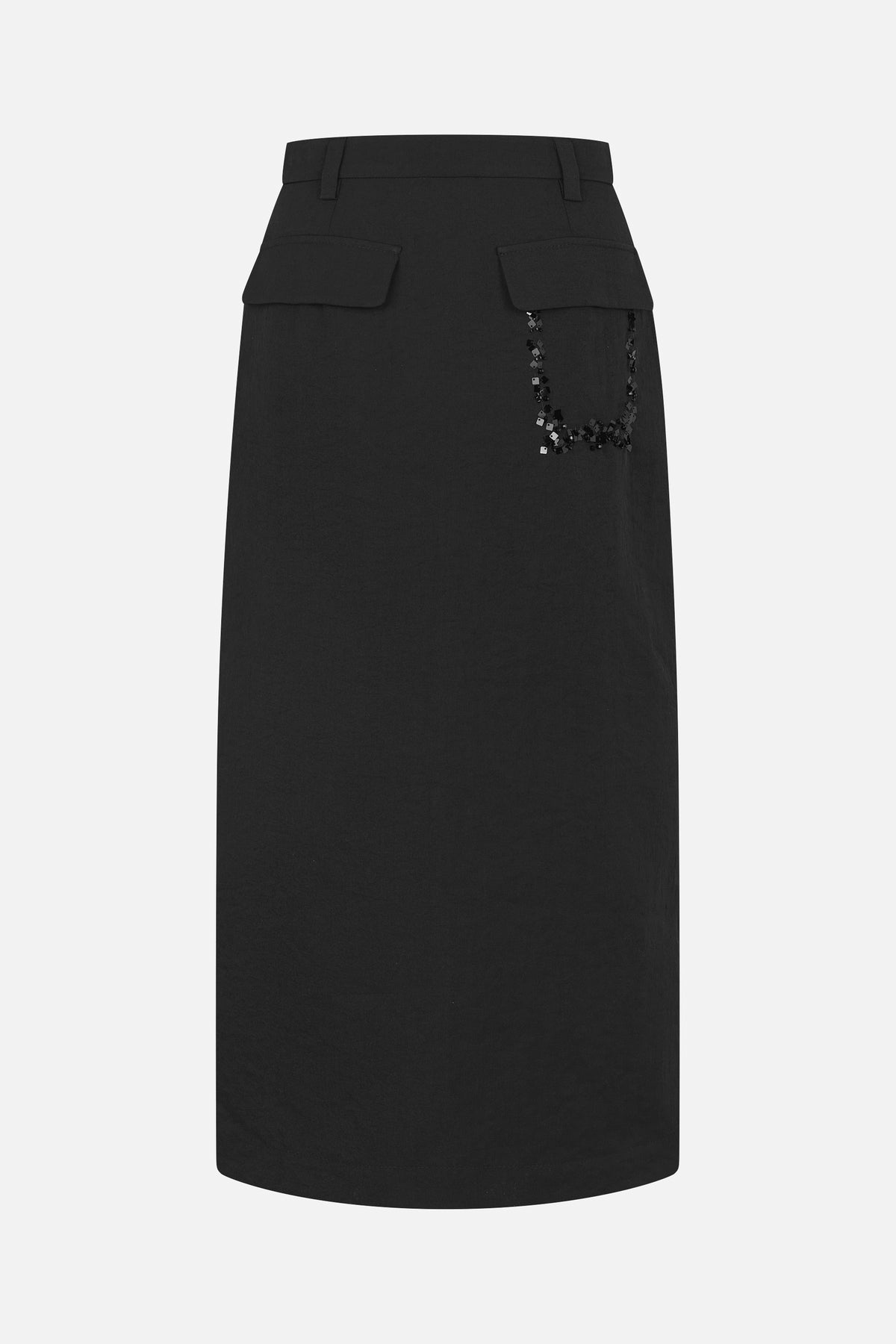 Back view of a black midi skirt with belt loops, flap pockets and dangling black-and-silver square embellishments.