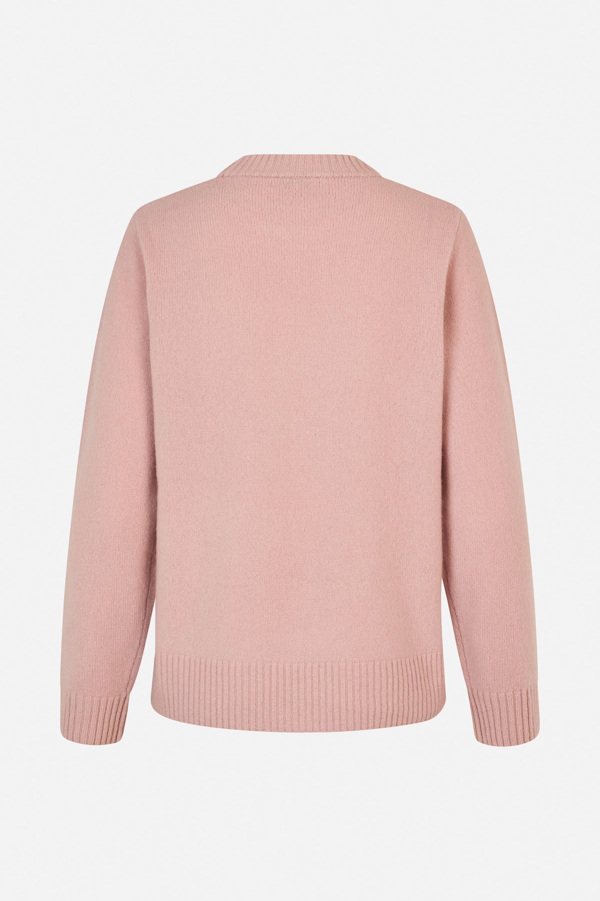 Back view of a pale pink long-sleeved knit sweater with a ribbed high neckline, cuffs and hem.
