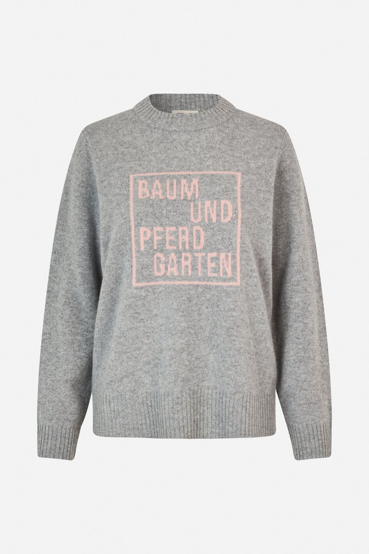 Front view of a marled grey knit sweater with ribbed trim and a pink Baum und Pferdgarten logo.