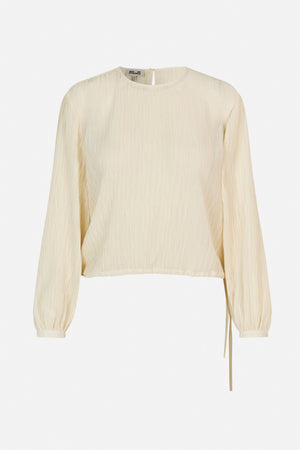 Front view of an ivory long-sleeved blouse with a fine crinkled texture, gathered cuffs, a round neckline and a tie at the hem.