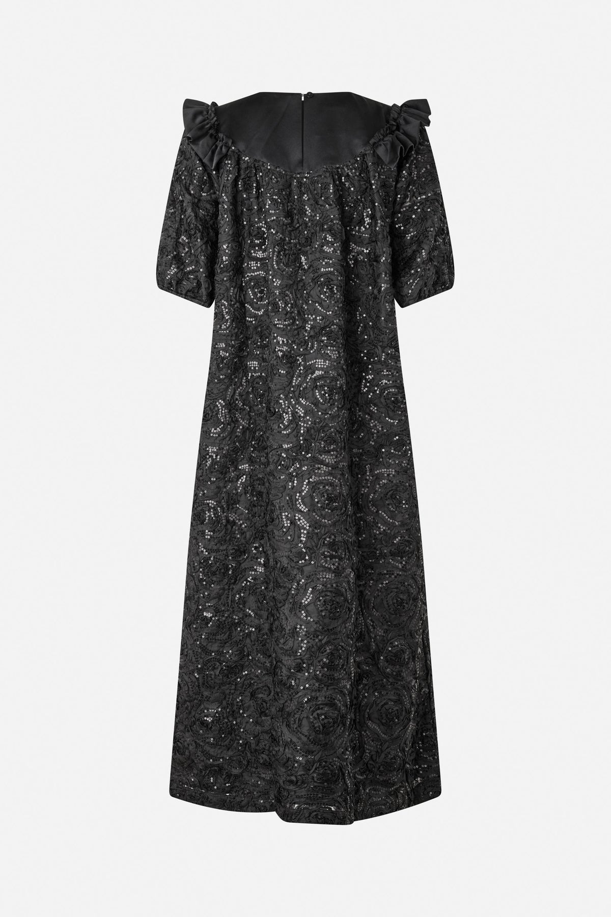 Back view of a long black dress with short puff sleeves, a ruffled neckline, back zipper and swirling sequin pattern.