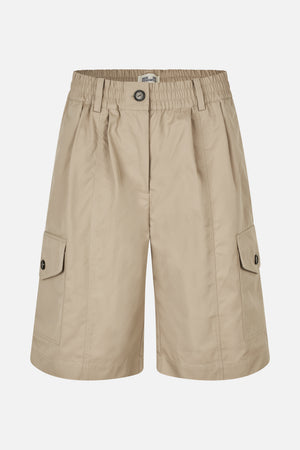 Front view of beige cargo shorts with an elasticated waistband, button closure and large flap pockets on the legs.