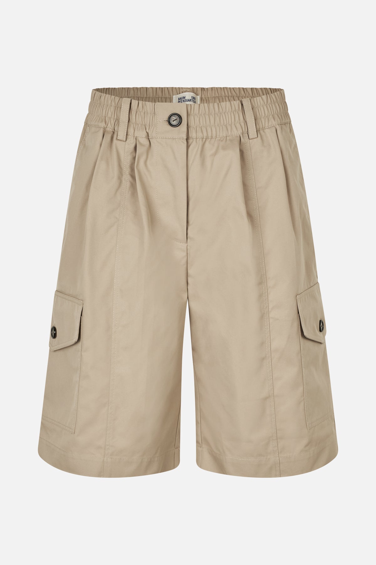 Front view of beige cargo shorts with an elasticated waistband, button closure and large flap pockets on the legs.