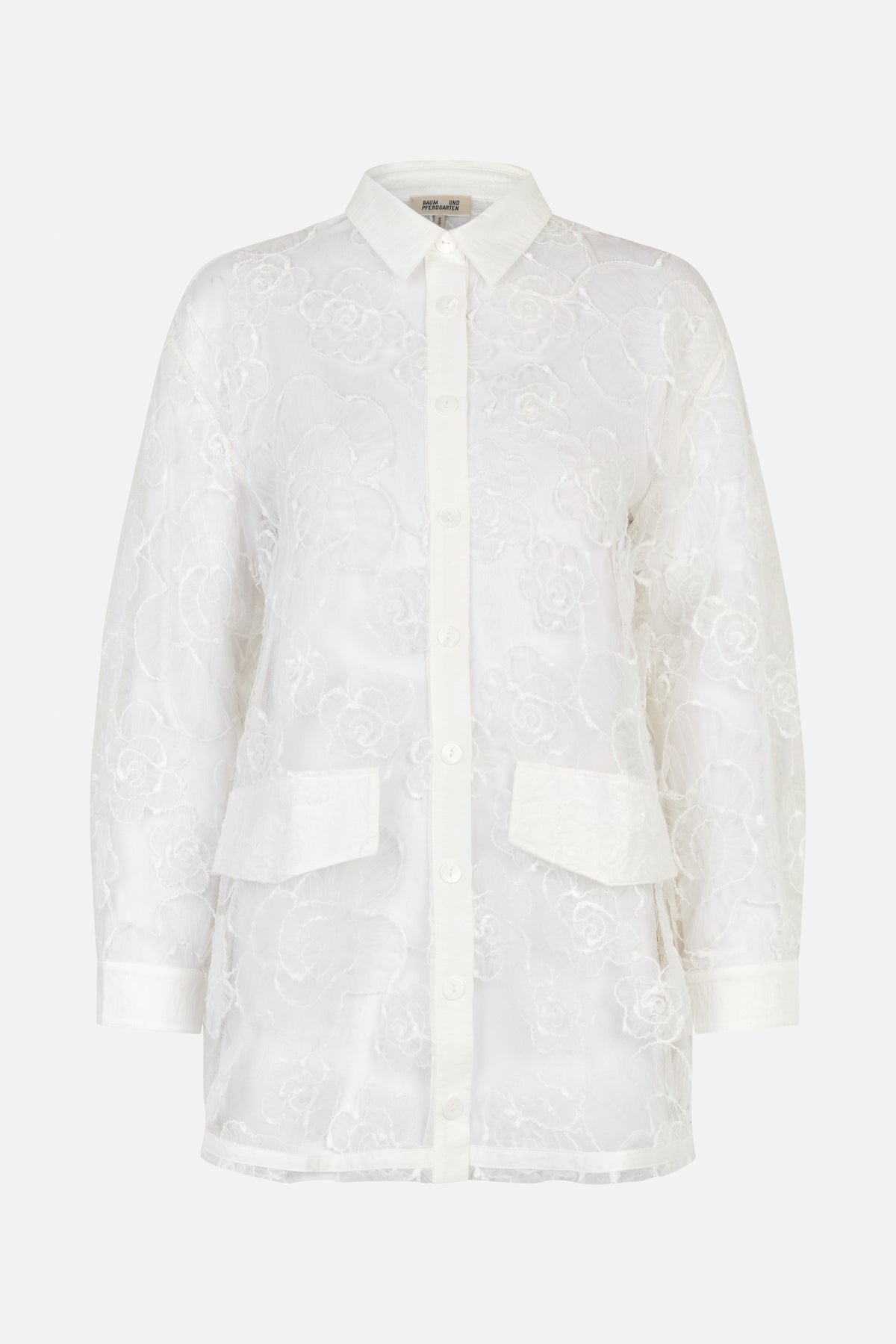White long-sleeved button-up shirt with a pointed collar, floral lace pattern, chest pockets and wide cuffs, shown from the front