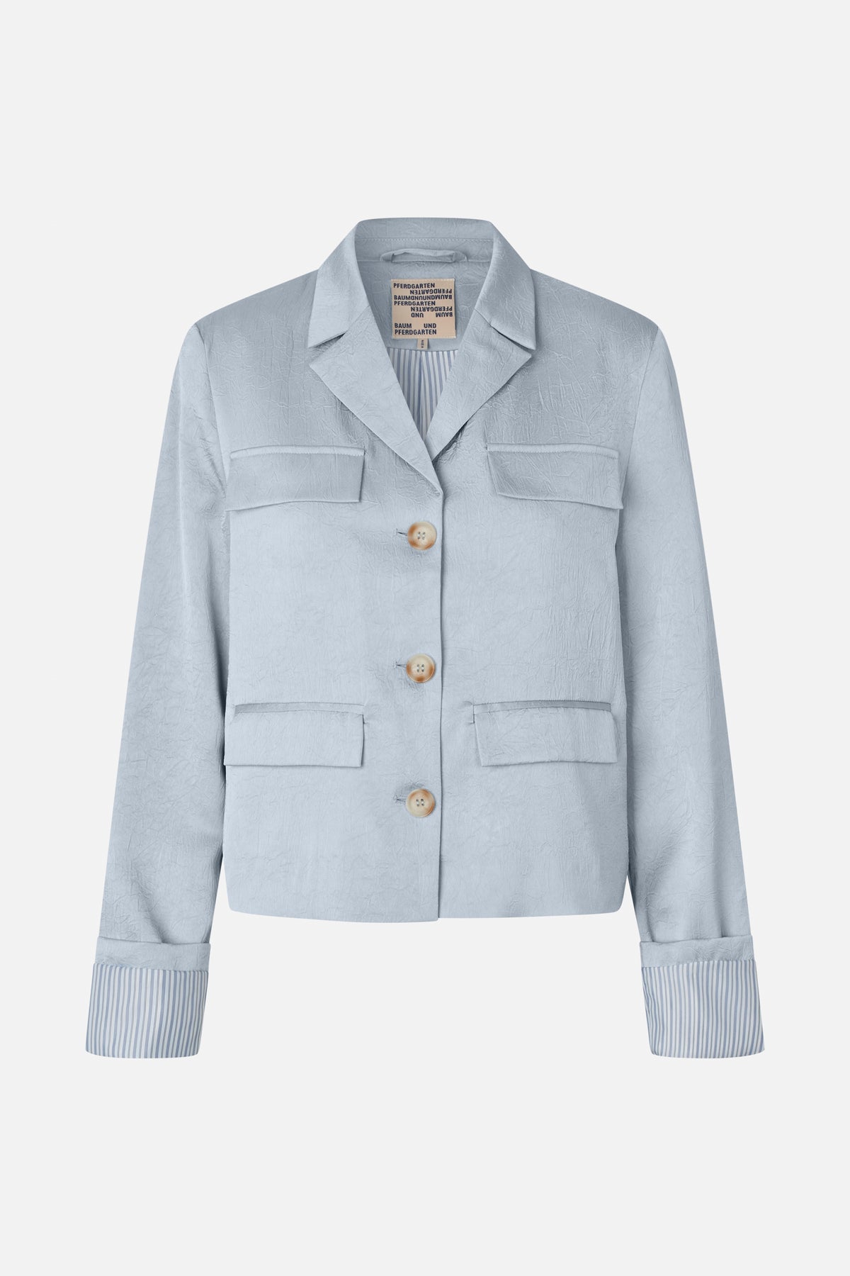 Front view of a pale blue textured blazer with notched lapels, four flap pockets, beige buttons and striped lining at the cuffs.