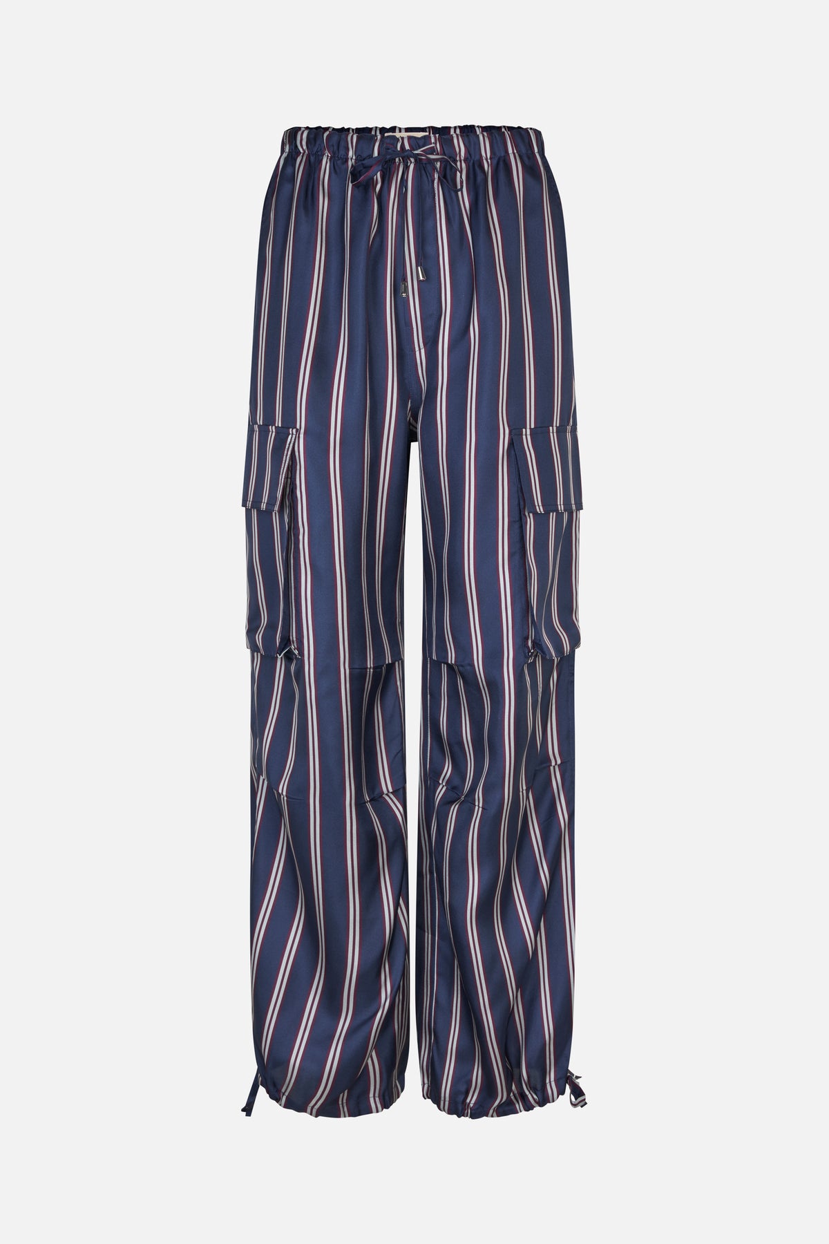 Front view of navy wide-leg trousers with burgundy and white vertical stripes, an elastic drawstring waist and flap cargo pockets.