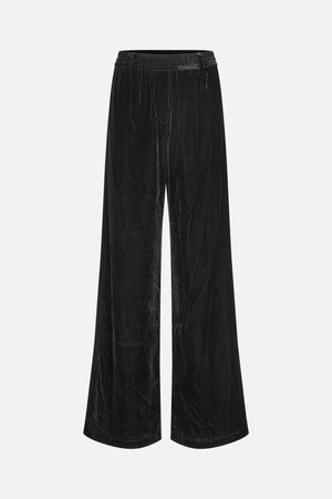 Front view of black velvet wide-leg trousers with a gathered elastic waistband.