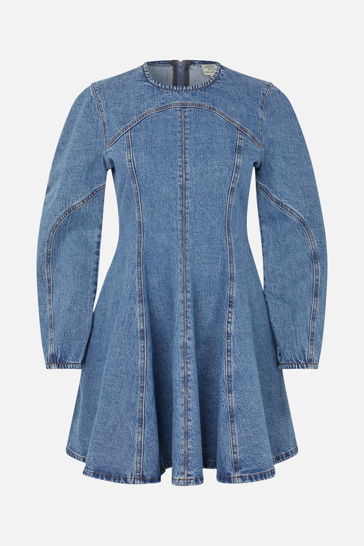 Front view of a blue denim long-sleeve dress with curved panel seams, a fitted waist and flared skirt.