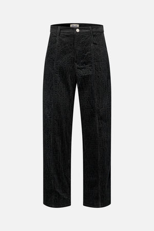 Front view of black wide-leg corduroy trousers with a button waist, belt loops and front pockets.