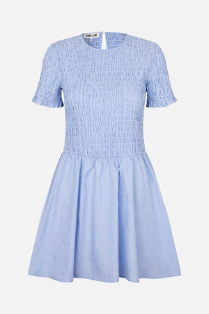 Front view of a light blue dress with fine white pinstripes, a smocked bodice, short flared sleeves and a gathered skirt.