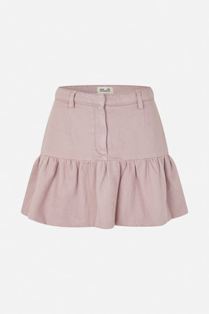 Front view of a dusty pink skirt with belt loops, a zip fly and a gathered flounce hem.