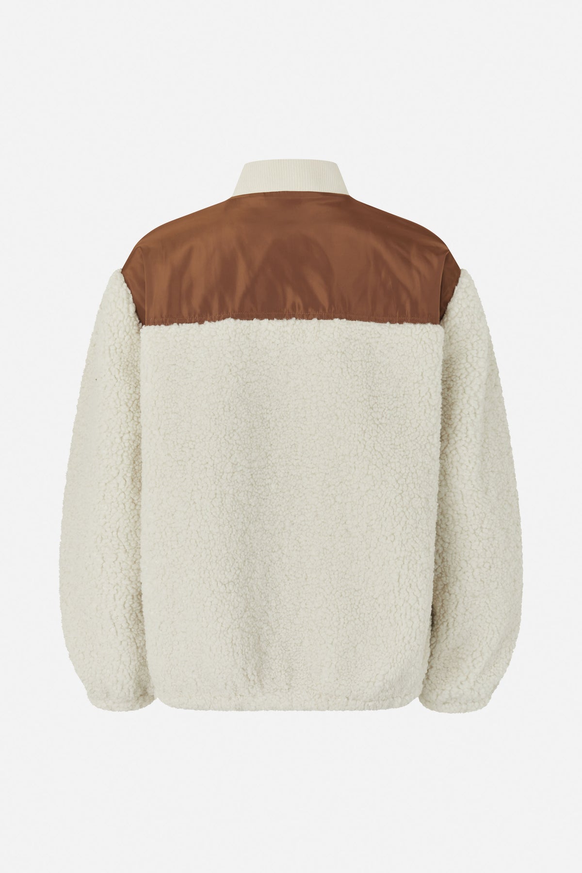 Back view of an ivory fleece jacket with a smooth brown shoulder panel and high collar