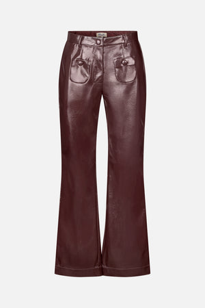 Front view of glossy burgundy wide-leg trousers with a buttoned waistband and two front patch pockets.